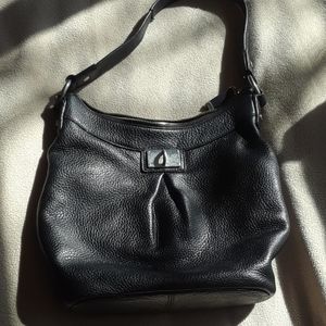 SAK brand used black leather purse